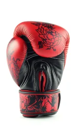 Red and black boxing glove with ornamental floral design