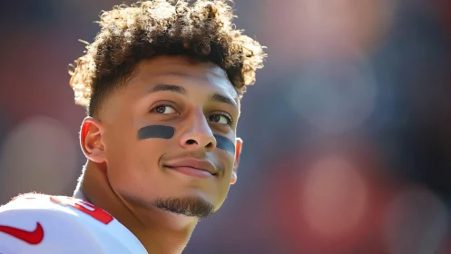 Portrait of football player in sunlit sideline close-up.