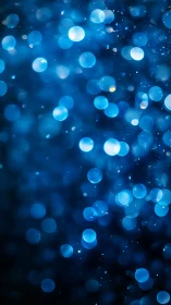 Midnight blue bokeh galaxies drift in dreamy silence.