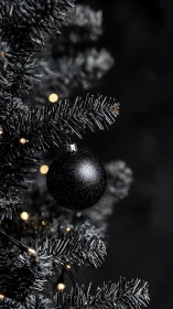 Midnight ornament glimmer on noir frost-tipped branches.