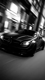 Midnight city streets welcome a sleek black sports car in motion