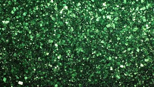 Emerald glitter texture catches reflective studio light.