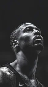 Monochrome closeup of focused basketball player portrait.