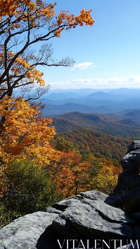Golden autumn mountains unfold beneath a clear, endless sky