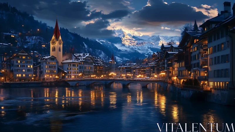 Snowy alpine town riverfront at blue hour with lit bridge.