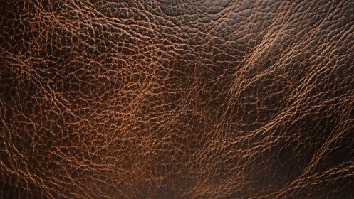Rich brown leather texture with deep natural grain pattern.