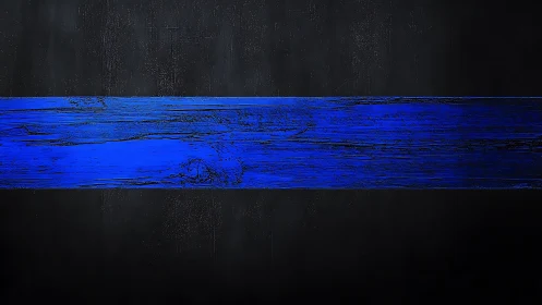 Electric cobalt timber stripe across midnight charcoal.