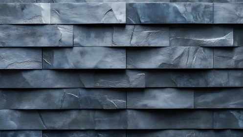 Modern stacked slate stone wall texture in cool gray tones.