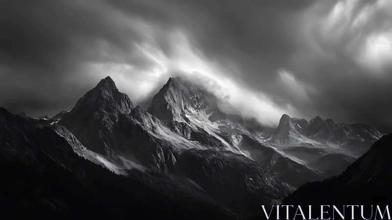 Storm-lit alpine massif renders sculptural monochrome drama