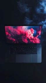 Laptop display emitting chromatic vapor cloud visualization.