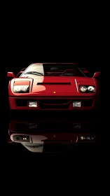 Red sports car front view on black reflective background.