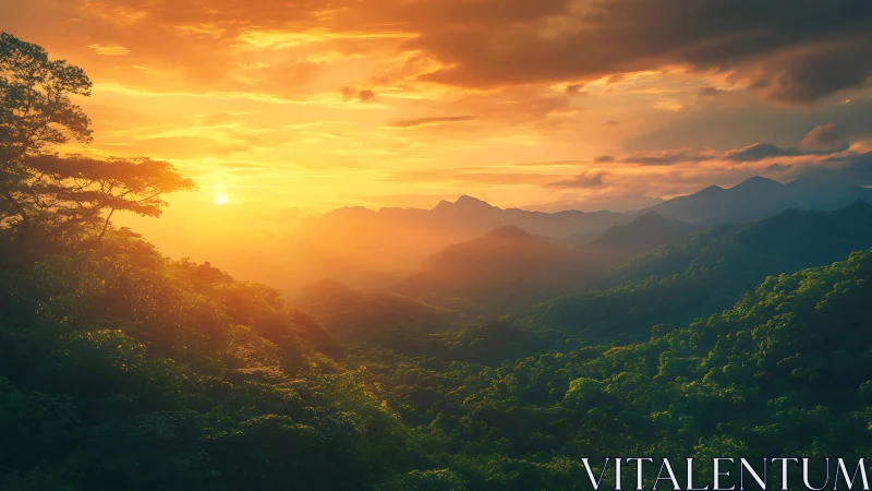 Sunrise pours molten gold across misty emerald mountains