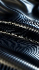 Curved carbon fiber weave under dramatic studio lighting.