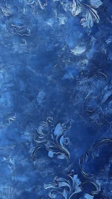 Midnight blue textured florals with embossed swirling leaves.