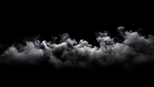 Dense rolling white smoke against solid black background.