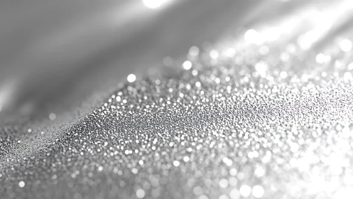 Shimmering silver surface glows softly in dreamy light