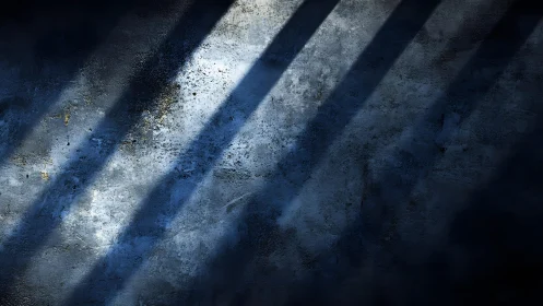 Dramatic Concrete Wall with Blue Shadows in Moody Lighting.