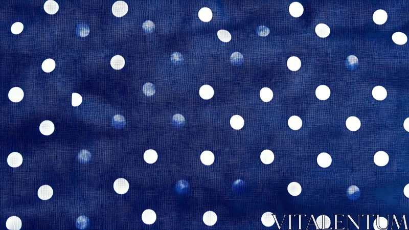Bold white polka dots punctuate textured navy fabric pattern.