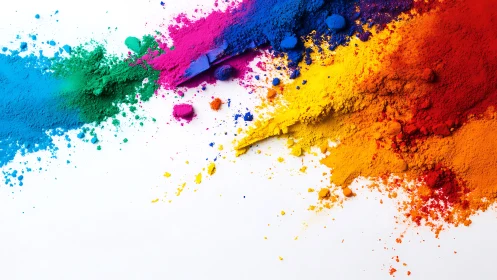 Exploding spectrum of powdered pigments on white backdrop.