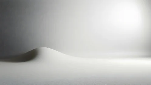 Minimalist white dune under diffused studio side lighting.
