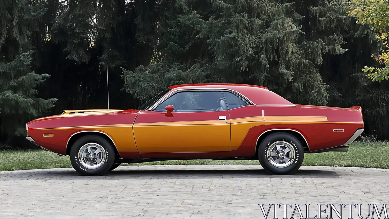 Classic red and orange muscle car parked by tall trees.