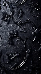 Black embossed floral scrolls curve across textured surface