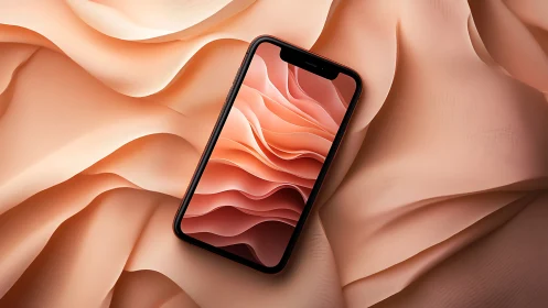 Smartphone with coral-toned liquid gradient wallpaper displayed against layered paper topography.