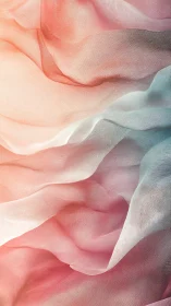 Layered translucent fabric folds in soft gradient light.