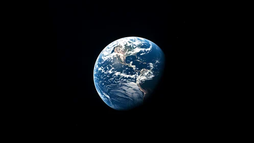Our blue planet hangs gently in the quiet darkness of space