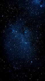 Star-salted midnight sky drifting through deep blue silence.