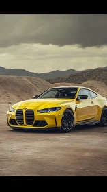 Yellow BMW sports coupe waits under stormy desert skies