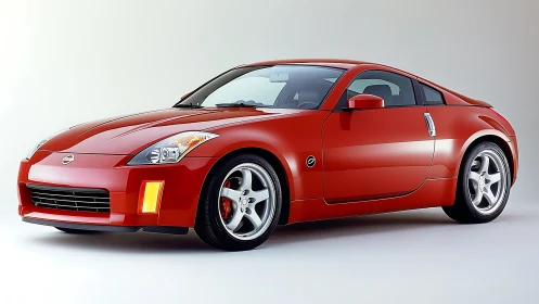 Sleek red sports coupe ready for an easygoing weekend drive.