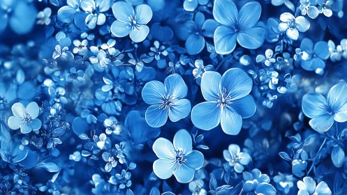 Blue floral composition with densely clustered small flowers in sharp and soft focus