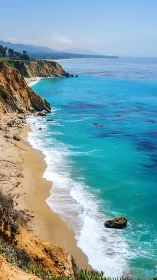 Steep coastal cliffs border turquoise ocean and sandy beach.