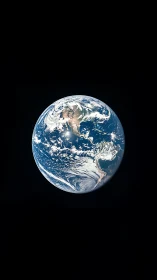 Planet Earth floats in deep black space, glowing softly.