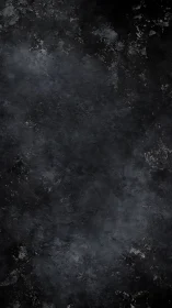 Dark grunge concrete texture forms a moody dramatic backdrop