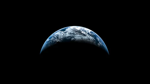 Earth horizon emerges from deep space shadow in stark contrast