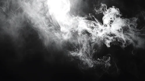 High-contrast turbulent smoke plumes illuminated against black field