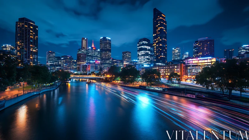 Long-exposure nocturnal cityscape with river reflections and light trails