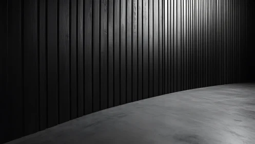 Shadowed timber wall quietly bends around concrete silence