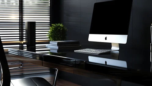 Minimalist workstation with desktop computer on glossy desk.