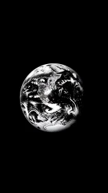 High-contrast monochrome Earth sphere isolated against deep black void