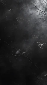 Dark cracked stone texture with subtle white weathering details.