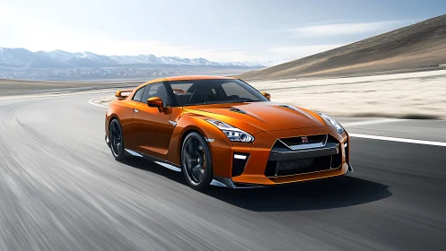 Orange sports coupe powers through desert highway curve.