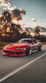 Red drift car cruises a highway under glowing sunset skies.