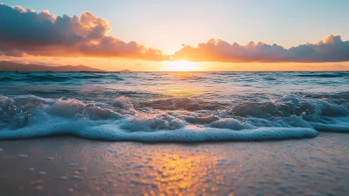 Sunlit surf rolling onto tranquil tropical shoreline at dusk.