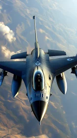 Sleek fighter jet slices dusk light above painted earth