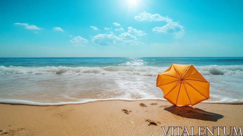 Yellow umbrella on bright sandy beach under midday sun.