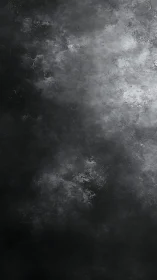 Monochrome textured dark cloud surface background.
