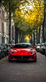 Red supercar stands poised beneath glowing autumn trees.